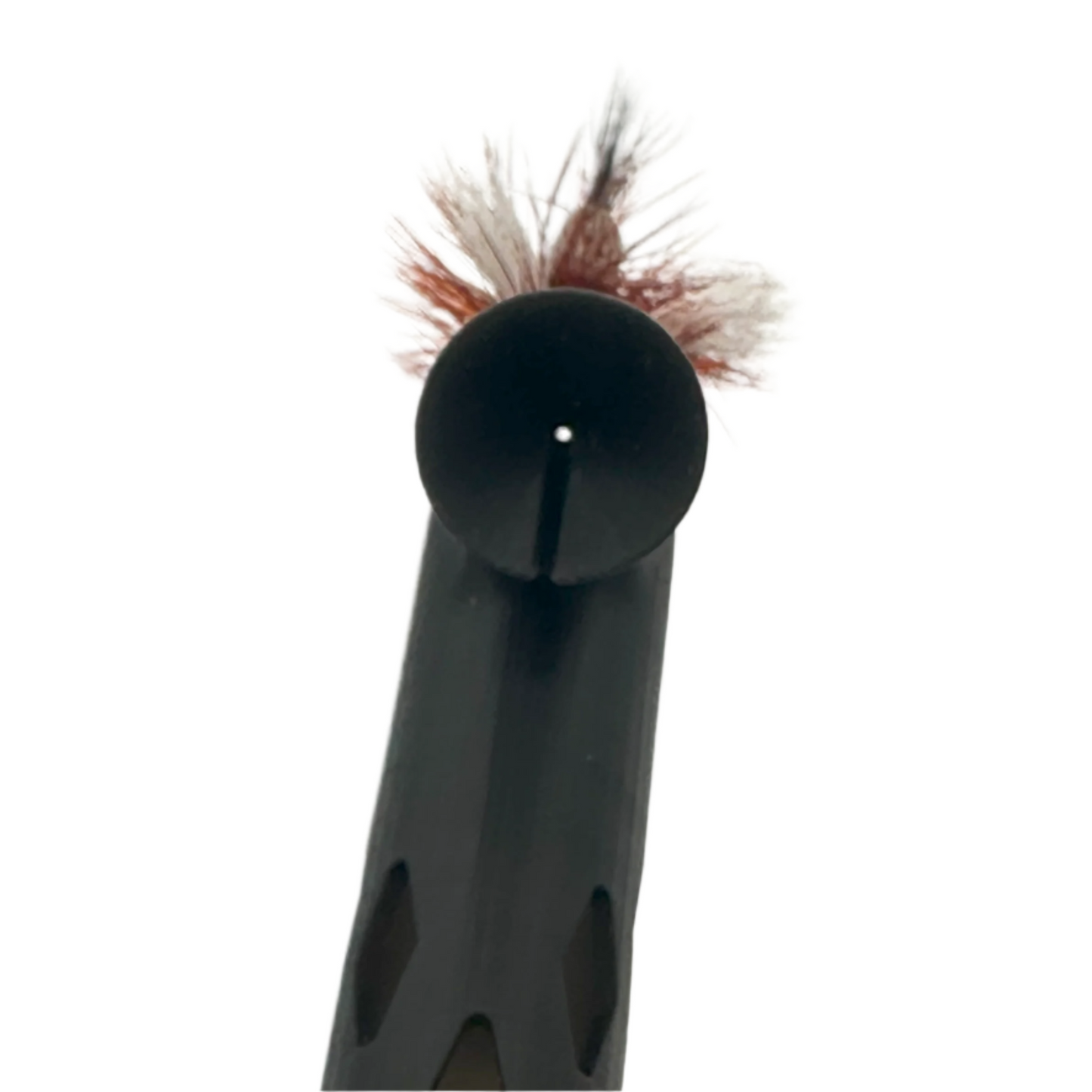 Close-up of a black tool with a red and black humpy fly head against a white background